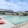 a swimming pool with lounge chairs around it