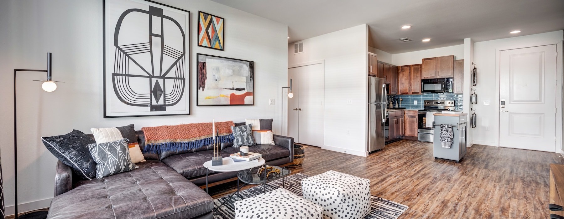 Beautiful living areas to match your lifestyle a living room with a couch and a fan