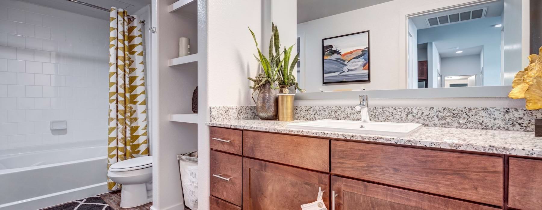 a bathroom with a large mirror